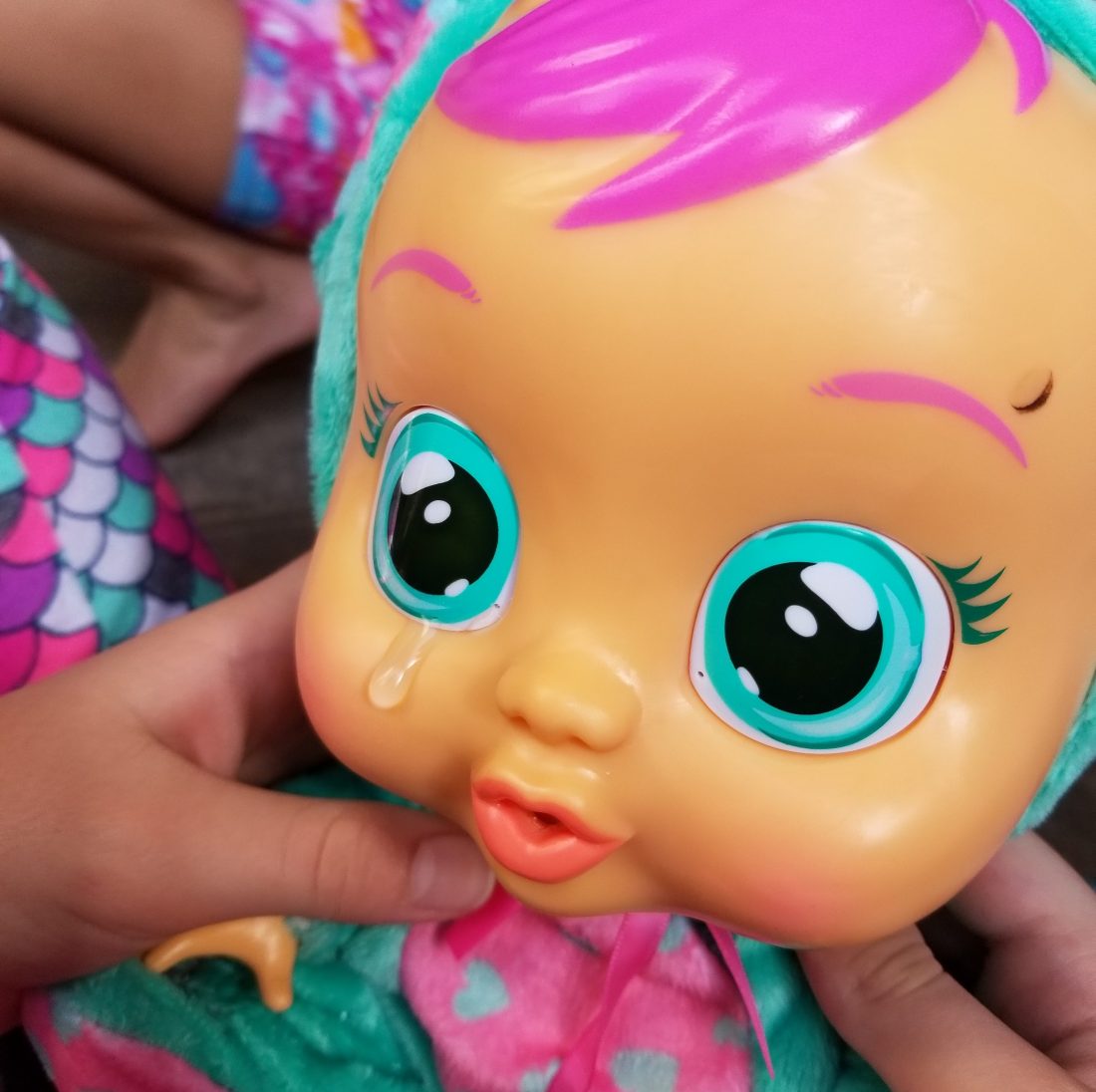 baby doll that cries real tears